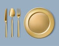 Gold plate, fork, spoon and knife Royalty Free Stock Photo